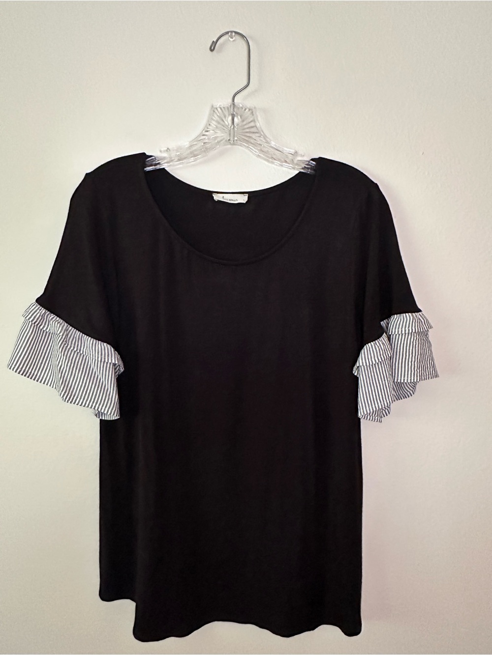 les amis black feminine top with mixed media in added sleeve ruffle. Size large